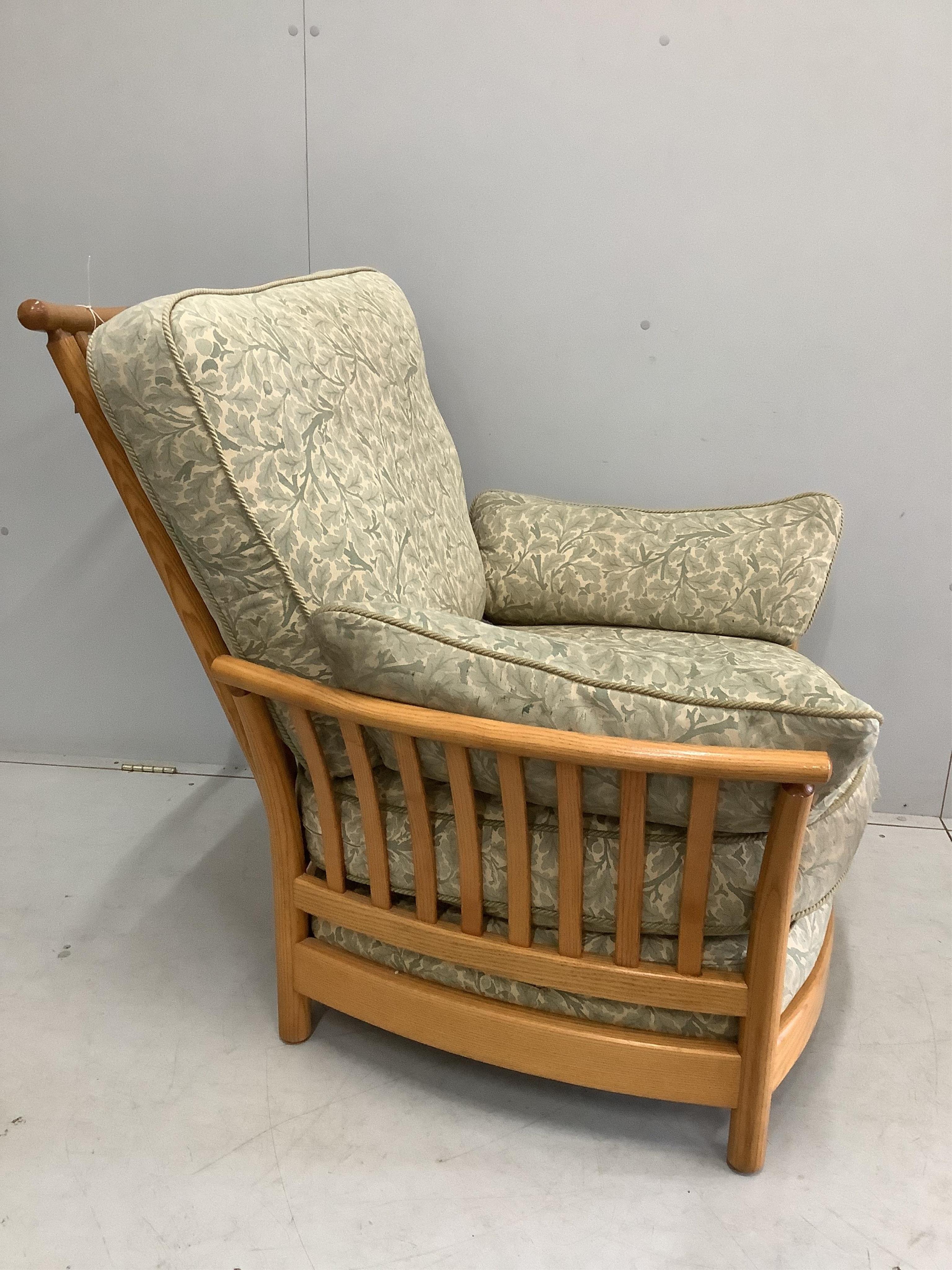 An Ercol ash Renaissance high back armchair, width 89cm, depth 90cm, height 98cm